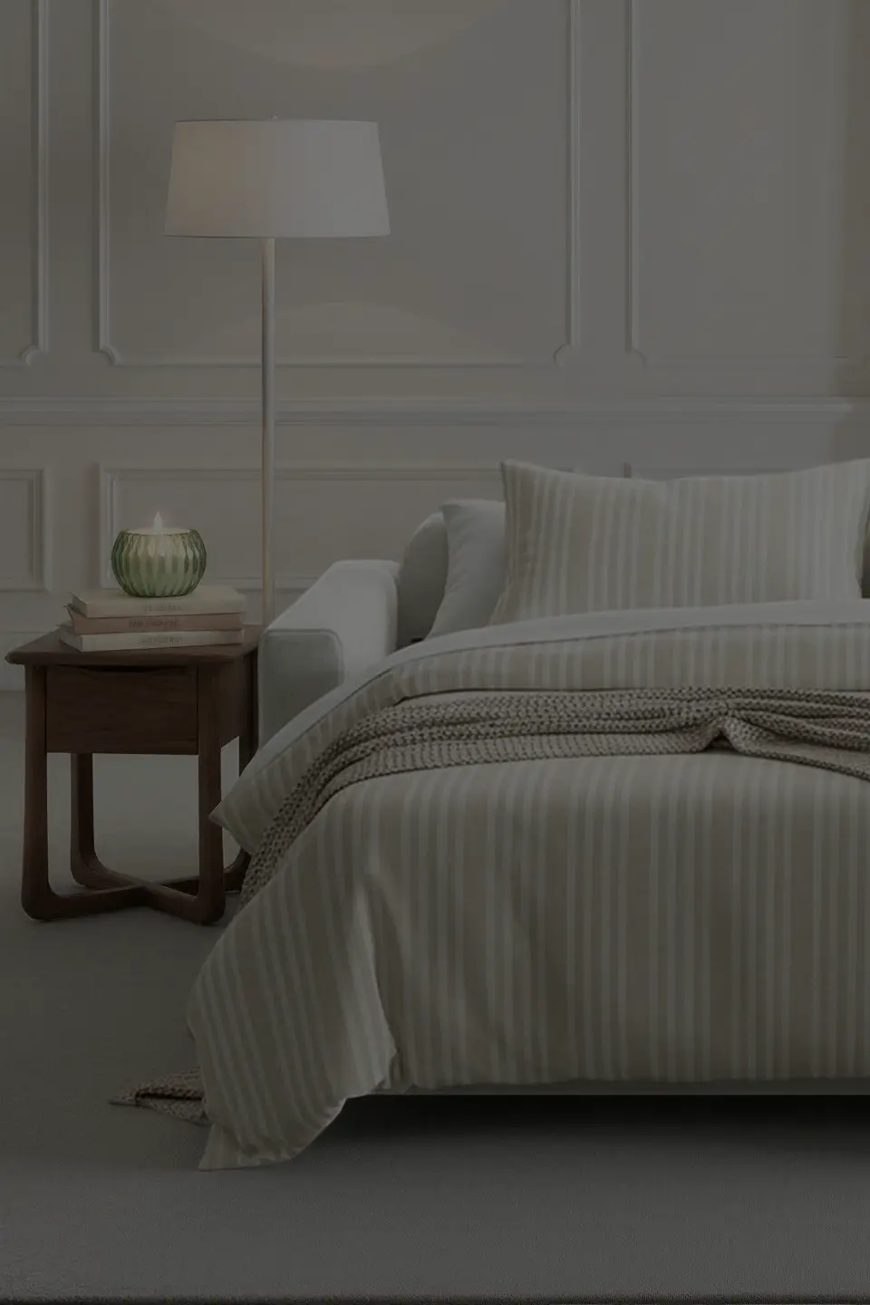 Belton King - Gemma 01 Luonto Belton king sleeper sofa shown open as king size sofa bed with striped bedding, light gray upholstered pull out couch.